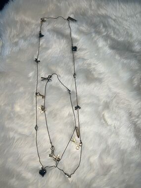 Betsey Johnson Gold and Black Multi Charm Heart Necklace